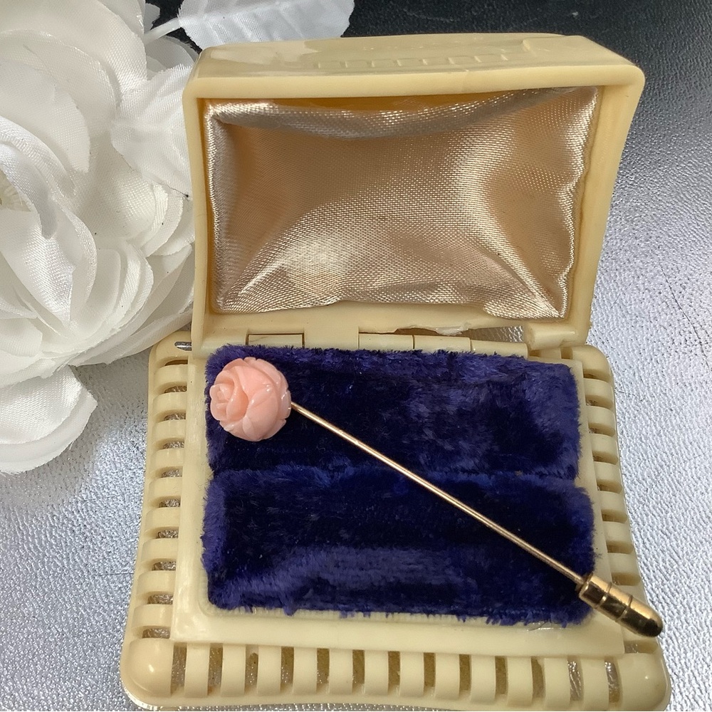 Carved coral rose pin